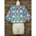 Adrienne Bloom In Joy Tatum Bubble Hem Top